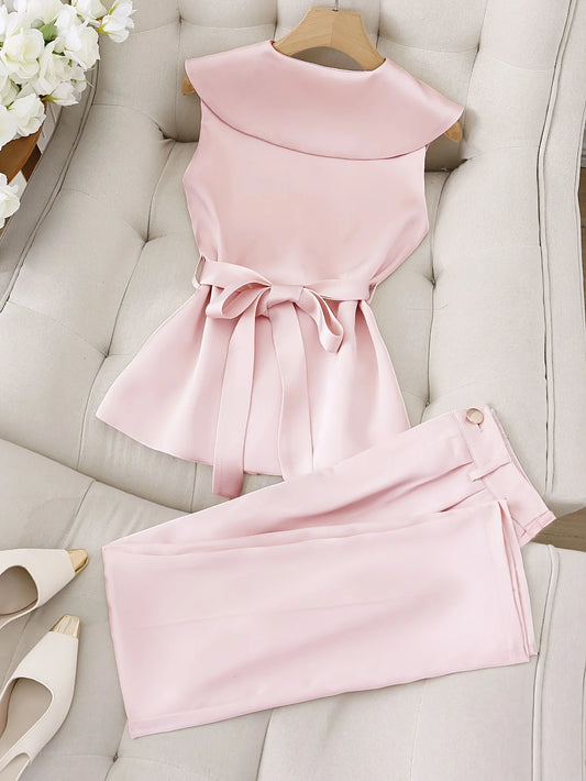 Fashionable, elegant, simple solid color sleeveless romantic date top and trousers